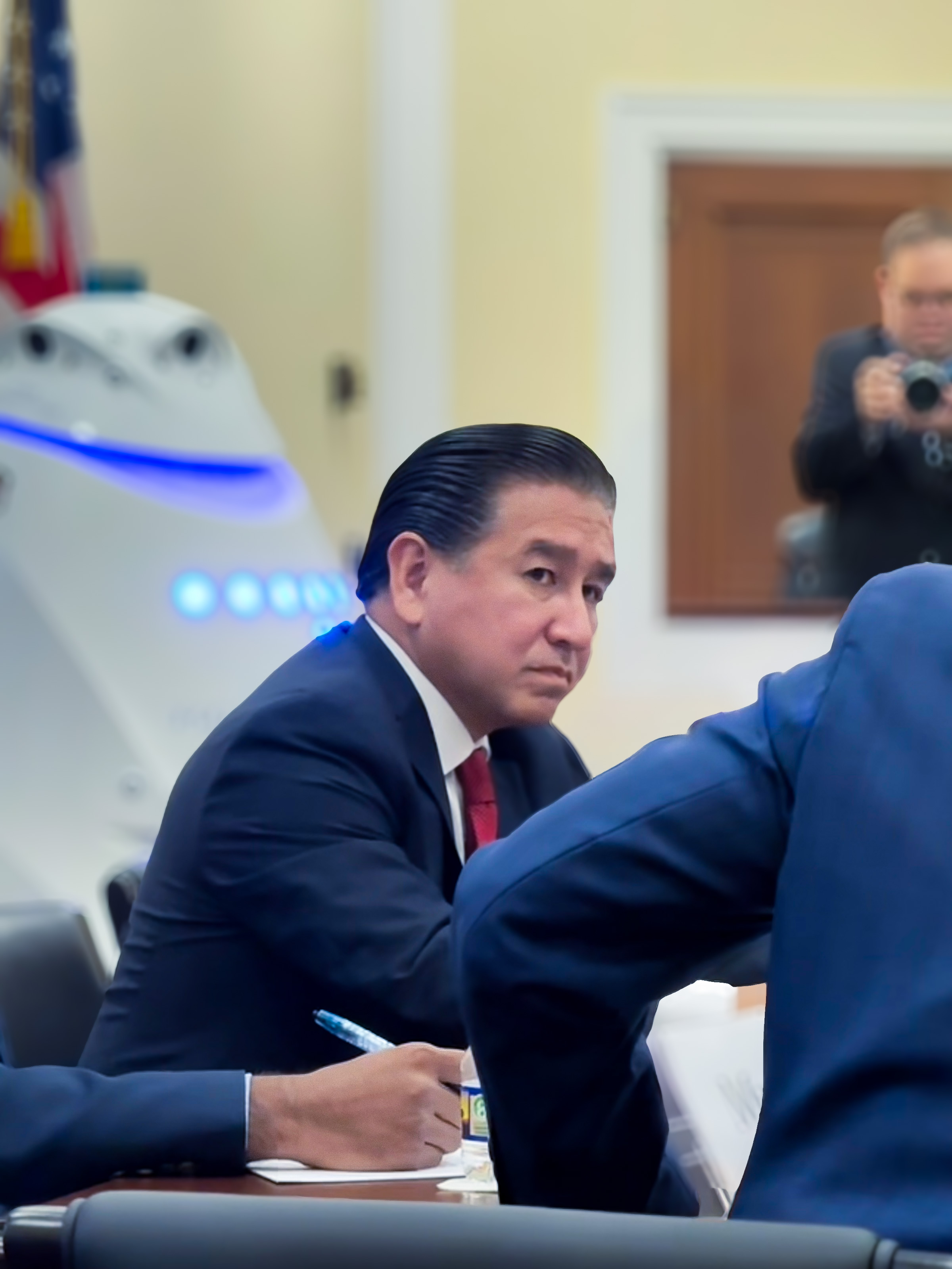 Knightscope Chairman & CEO William Santana Li testifying before the U.S. House Oversight Committee, alongside a Knightscope K5