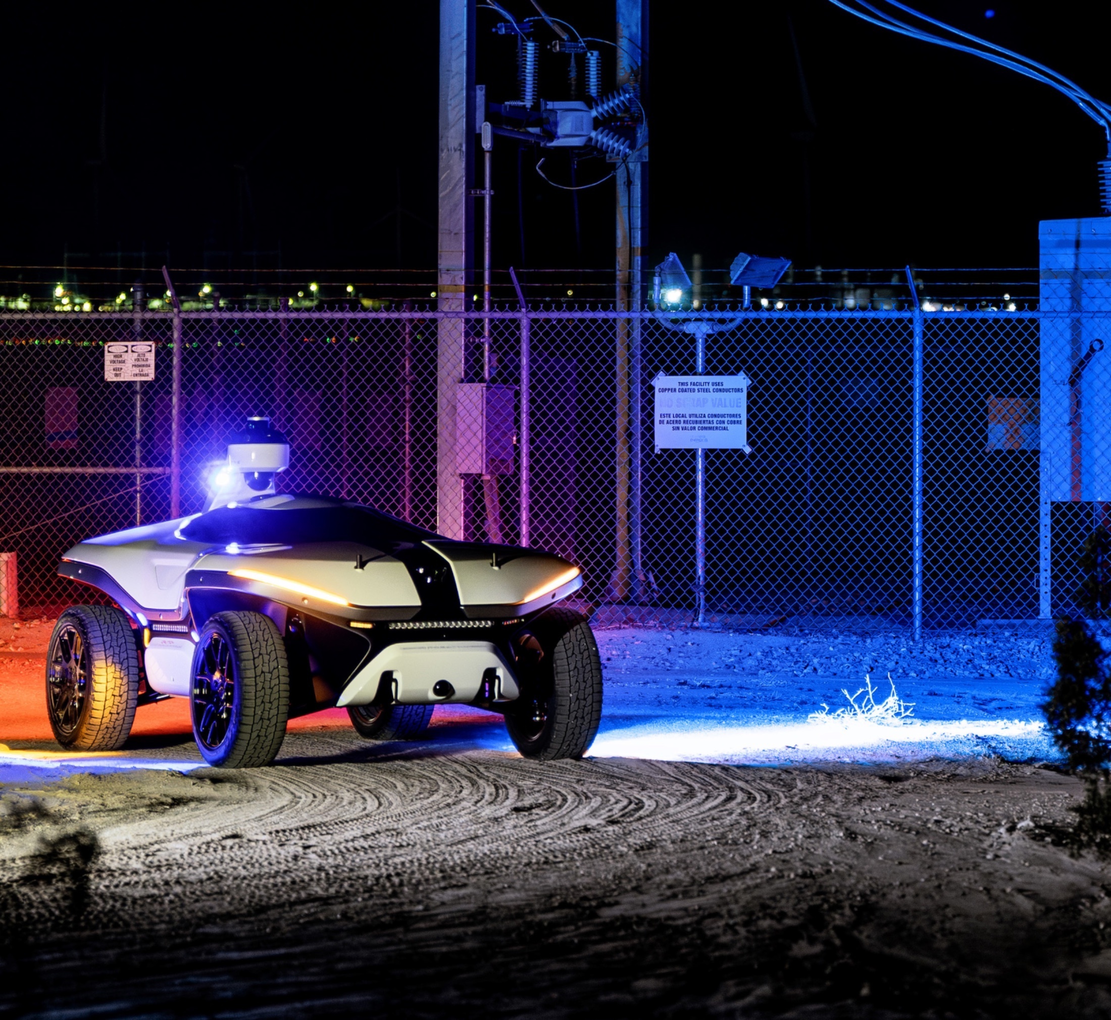 Knightscope K7 autonomous security robot at an electrical substation